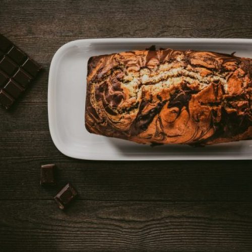 <a href="https://www.pexels.com/photo/chocolate-cake-in-white-plate-beside-chocolate-bars-890580/" target="_blank" rel="noopener">Oleg Magni</a> at Pexels